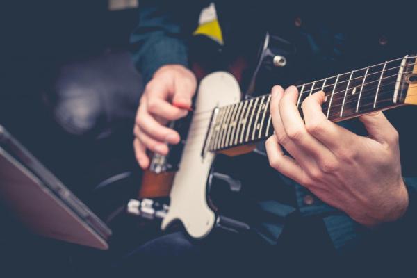 Omni Guitar Tuition