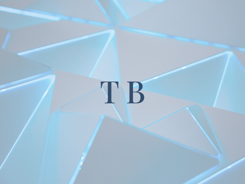 T B